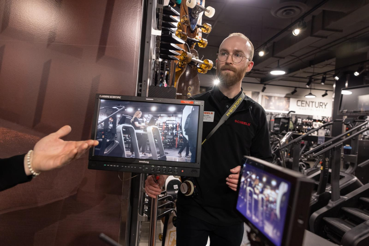 Andy Leines holding screen